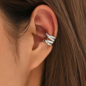 Elegant silver-toned four-layer crisscross ear cuff featuring micro-paved cubic zirconia