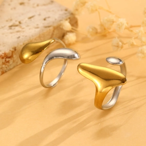 Modern abstract water ripple open ring in mixed gold and silver tones with fluid design