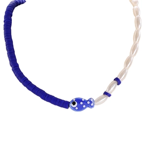Close-up of ocean-style beaded necklace with blue Heishi beads and ceramic fish pendant