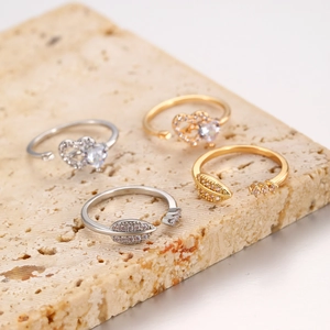 Adjustable open rings in gold and silver finish with heart and leaf zircon stone designs