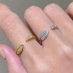 Arrow and leaf open rings with cubic zirconia crystals in gold and silver plating