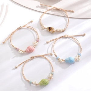 Handwoven starfish and shell ceramic charm bracelets with adjustable braided ropes