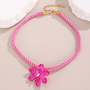 Pink cotton rope necklace with large exaggerated enamel flower pendant and gold lobster clasp