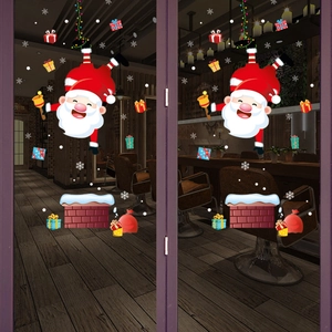 Adesivi natalizi con Babbo Natale nel camino, scatole regalo colorate e fiocchi di neve bianchi