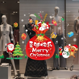 Christmas window decals with Santa, reindeer and festive red gift bag decorations