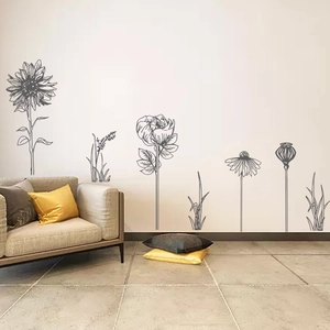 Minimalist grey sketch sunflower wall stickers in a modern living room setting