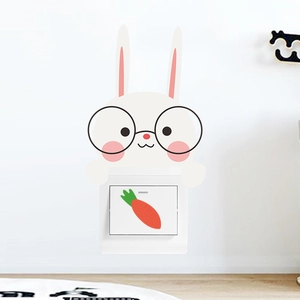 Detail view of cute cartoon bunny and carrot wall sticker for creative light switch decor
