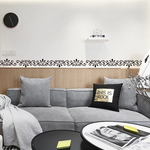 Détail du sticker mural noir aux motifs rétro pour la décoration du salon moderne