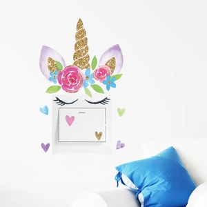 Close-up of unicorn wall stickers with glitter horn and floral detail for switch decor