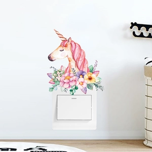 Detail of cartoon unicorn wall sticker with watercolor flowers for light switch decor