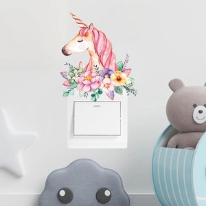 Nordic cartoon unicorn wall sticker with floral pattern decorating a white power switch