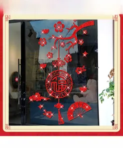 Chinese New Year Fu character window sticker with red plum blossoms and fans on glass