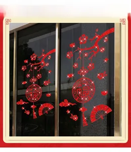 Detailed view of red Lunar New Year window stickers with glitter plum and Fu character