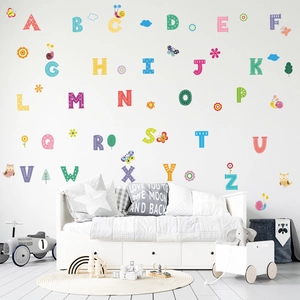 Colorful A-Z alphabet wall stickers set in a cozy children bedroom decor setting