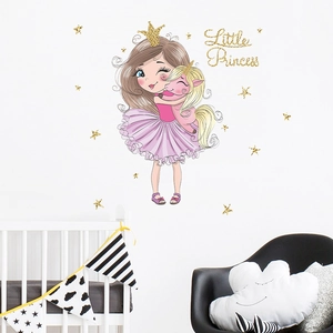 Detail of princess and unicorn wall sticker with stars in a cozy child's bedroom setting