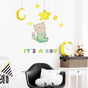 Detailed wall sticker featuring a cartoon cat on a moon with stars for a boy's nursery room