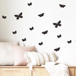 Minimalist black butterfly wall stickers for bedroom decor with 3D flying effect