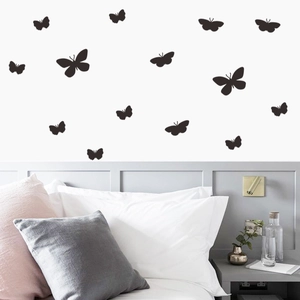 Minimalist black butterfly wall stickers in silhouette style for bedroom wall decor