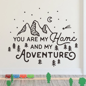 Detail of mountain wall decal with 'You Are My Home And My Adventure' quote text