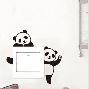 Cute panda switch sticker decoration featuring hand-drawn pandas on white wall