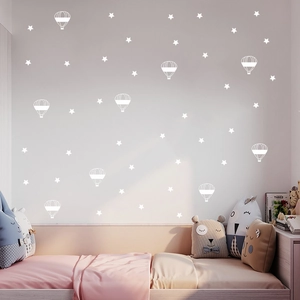 Detailed white hot air balloon and stars wall stickers for a modern nursery decor