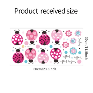 Cartoon pink ladybird wall sticker detail showing the 60x30cm layout of floral decals