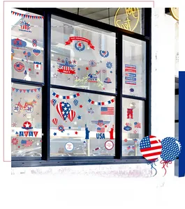 Independence Day window static stickers featuring flags, stars, and fireworks on glass