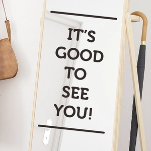 Minimalist 'IT'S GOOD TO SEE YOU!' vinyl wall decal on mirror in entryway setting