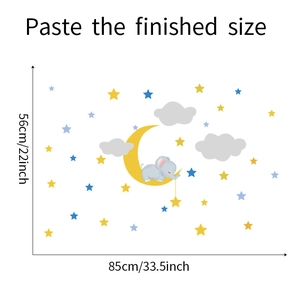 Size chart showing cartoon elephant on moon wall decal measuring 85cm by 56cm on white background
