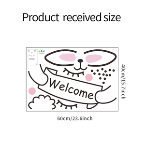 Flat lay of cartoon rabbit wall sticker with Welcome banner and size dimensions 60x40cm