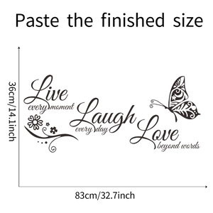 Detail of inspirational vinyl wall decal with butterfly and floral motifs measuring 36x83cm