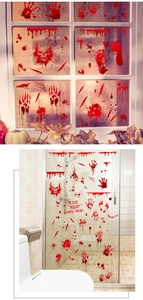 Detail of Halloween bloody handprints and scary text stickers for window decoration