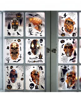 Detail view of Halloween static window decals featuring skulls and spooky elements