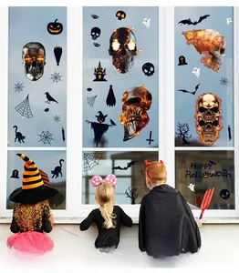 Halloween window static stickers showing ghosts, pumpkins and skulls on glass surface