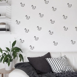 Minimalist black geometric swan wall stickers in a modern Nordic living room setting