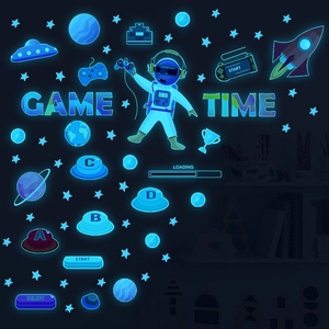Luminous space astronaut and gaming wall stickers set with glowing blue fluorescent effect