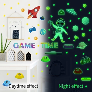 Luminous space astronaut game console wall stickers with daytime and night glow effect