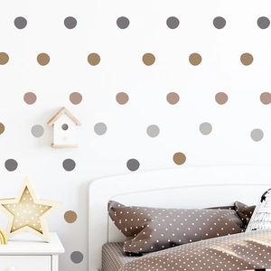 Detailed view of Morandi colored round dot wall stickers in a cozy bedroom setting
