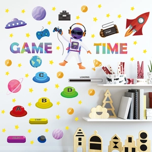 Glow in the dark astronaut and game controller wall stickers set with colorful planets