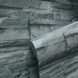 Detailed texture of self-adhesive 3D grey stone brick wallpaper with thick industrial backing