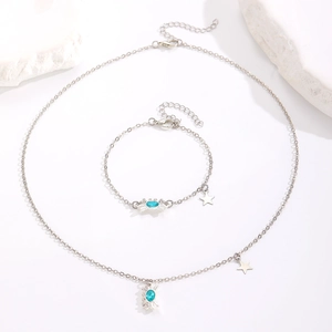 Conjunto de joyas de cangrejo plateado con piedras turquesas y colgantes de estrella en piedra