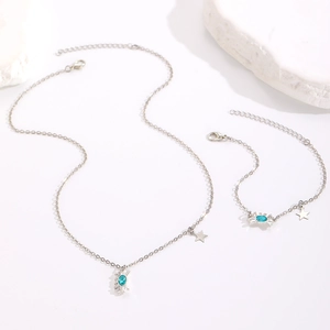 Conjunto chic de collar y pulsera de cangrejo plata con diamantes azules y estrellas