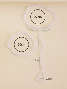 Detail view of boho white faux pearl beaded toe anklet with exact size measurements