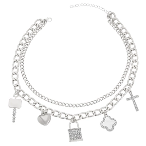 Close-up of silver punk layered chain necklace with heart, lock and clover charms