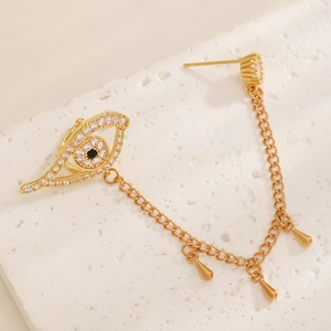 Gold Evil Eye ear cuff with sparkling zircon fringe tassels and blue stone detail