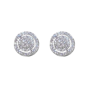 Detailed macro view of silver stud earrings with concentric circles and pavé-set zircons