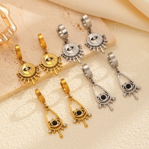 Boucles d'oreilles créoles evil eye en acier inoxydable avec charmes lune et soleil