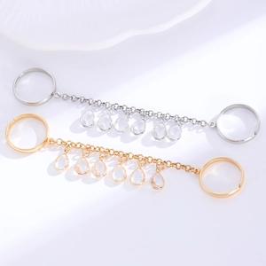 Elegant gold and silver link chain rings with sparkling teardrop zircon crystal tassels