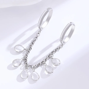 Silver chain ring featuring clear pear-cut cubic zirconia tassels with a dangling drop design
