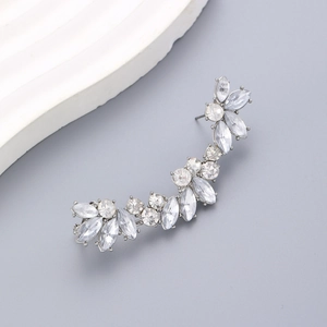 Detailed view of silver ear crawler featuring micro-pave cubic zirconia floral pattern
